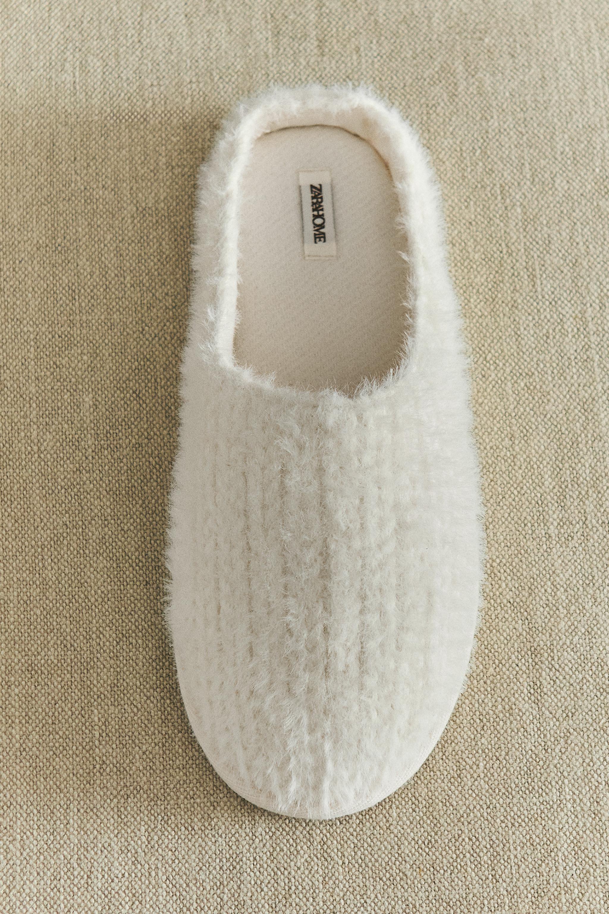 SLIPPERS WITH BRAIDED FAUX FUR DETAIL